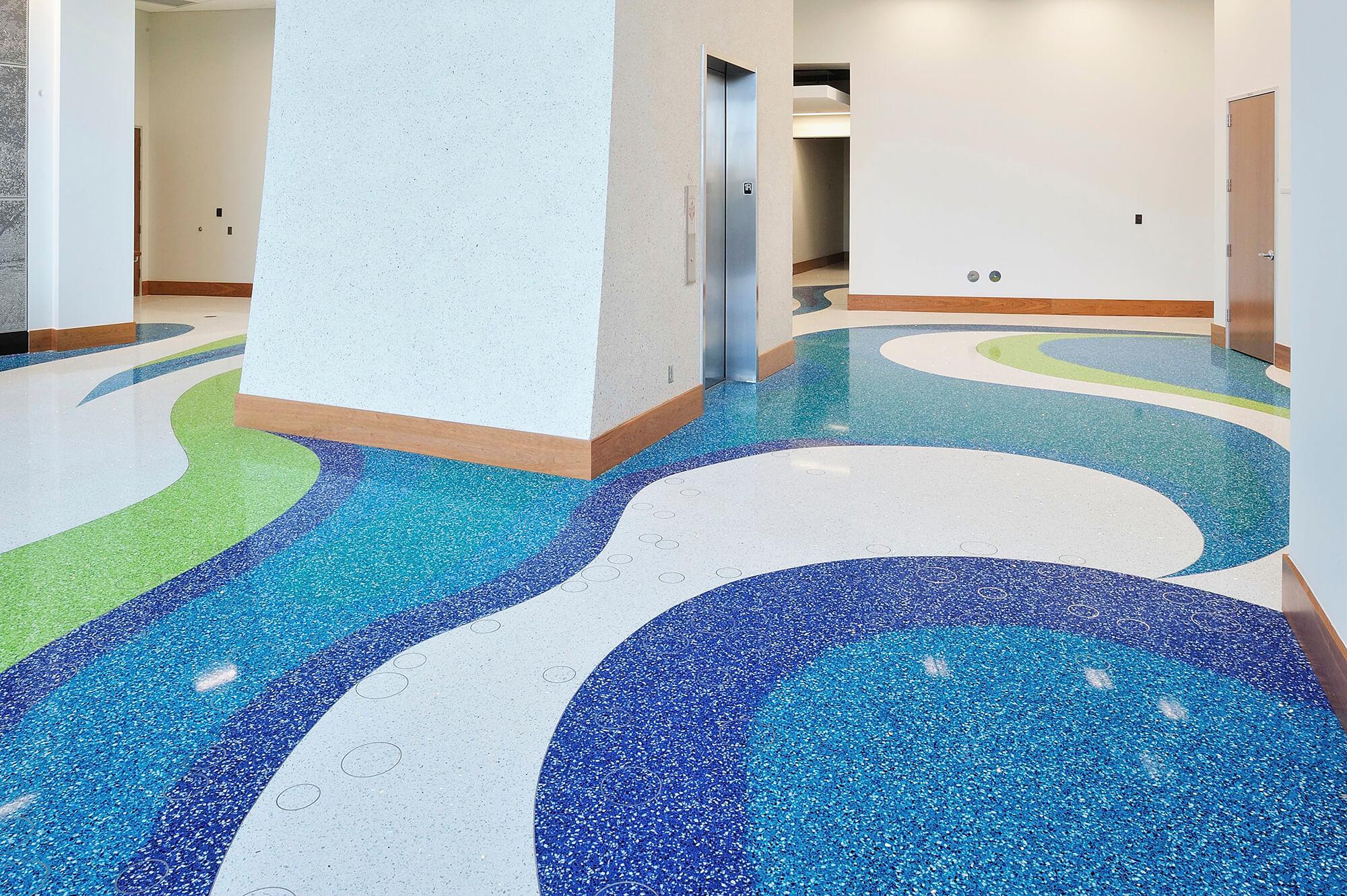 Commercial terrazzo lobby floor installed by F & M Tile